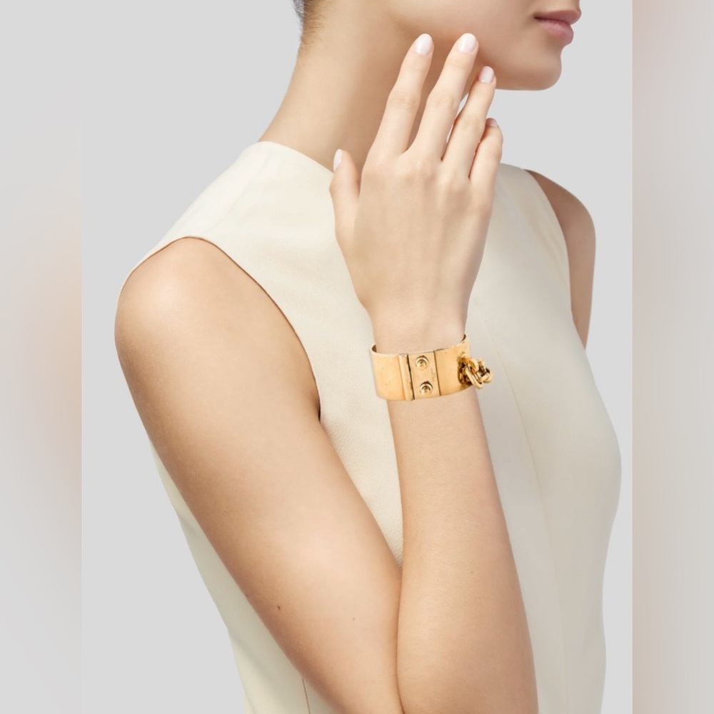Authentic Louis Vuitton Gold Metal “Lock Me” Manchette Wide Cuff Bracelet Bangle